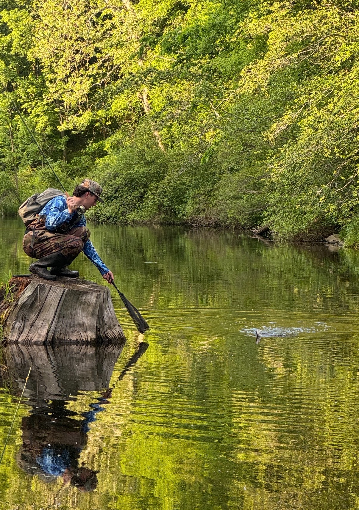 AID THE CHASE rugged bank fishing action shot